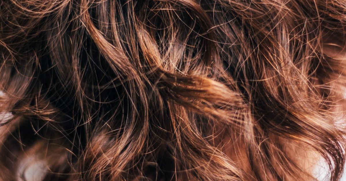 "Long hair tapers showcasing elegant hair care techniques."